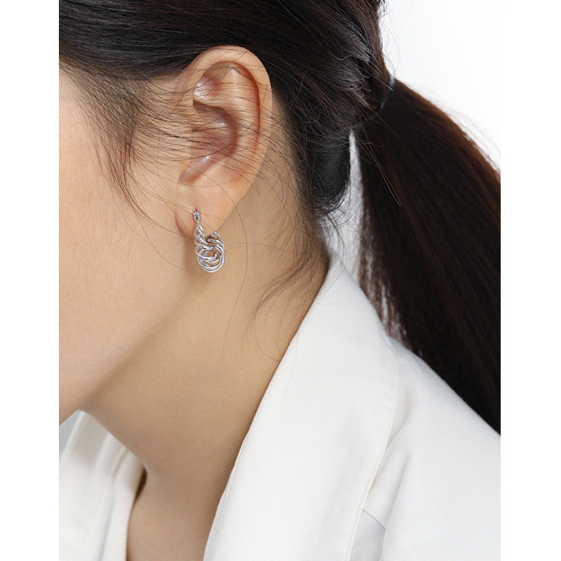 Casual Hollow Spring Twisted Silver Hoop Earrings