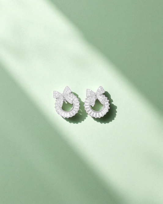 Bow Charm Loop Silver Earrings